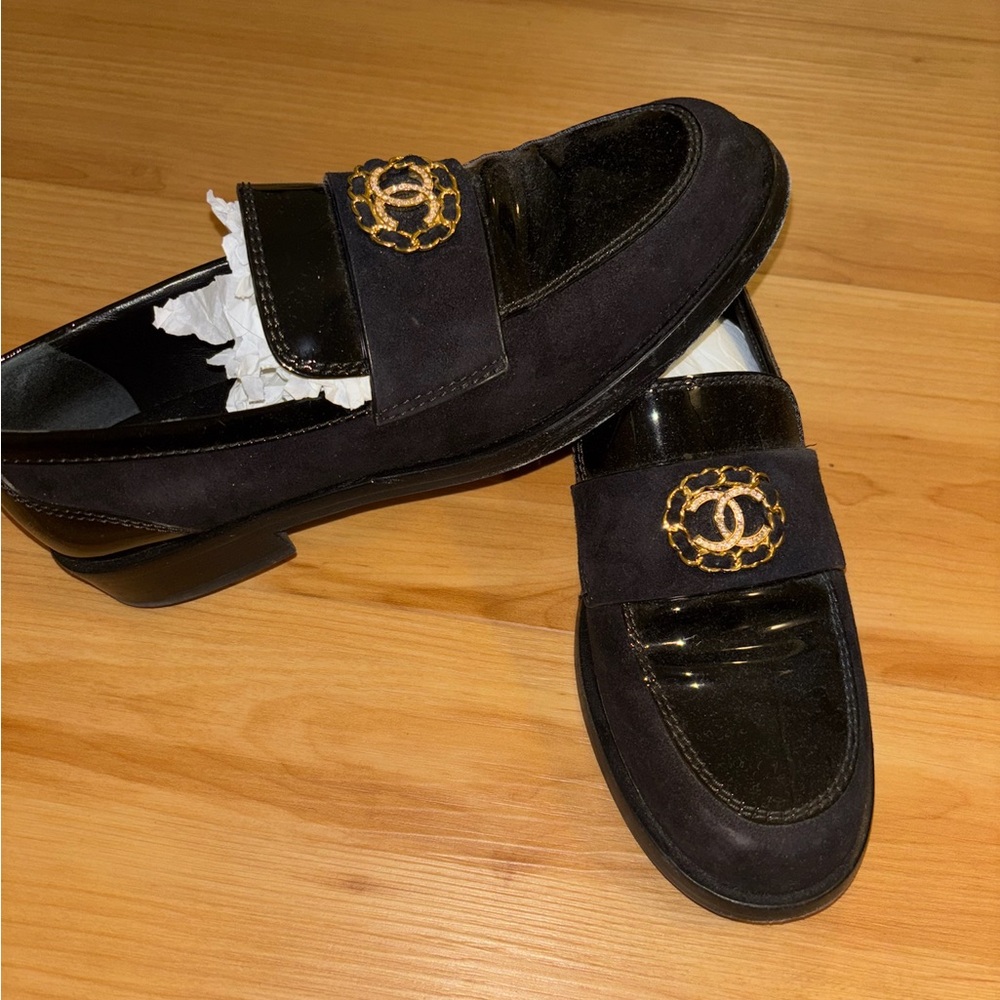 CHANEL Black Loafers with Gold Detailing